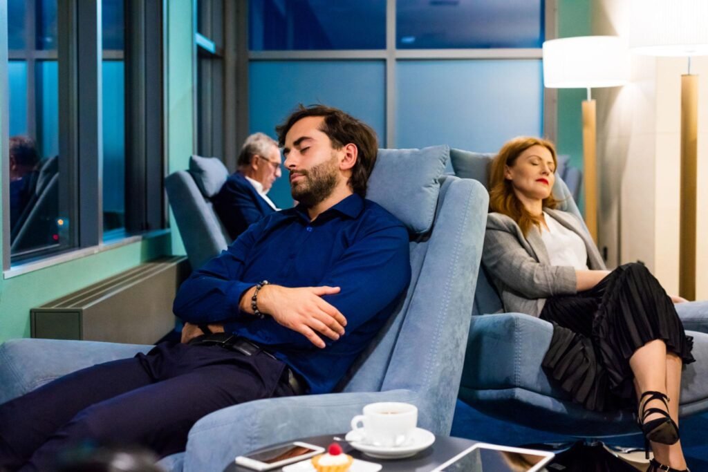 luxury traveler resting after long flight concierge planning